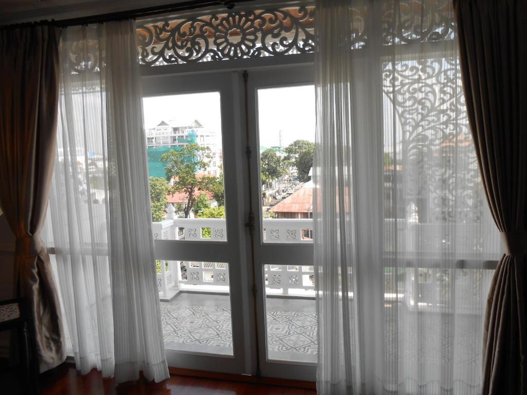 Dhavara Boutique Hotel Vientiane Oda fotoğraf